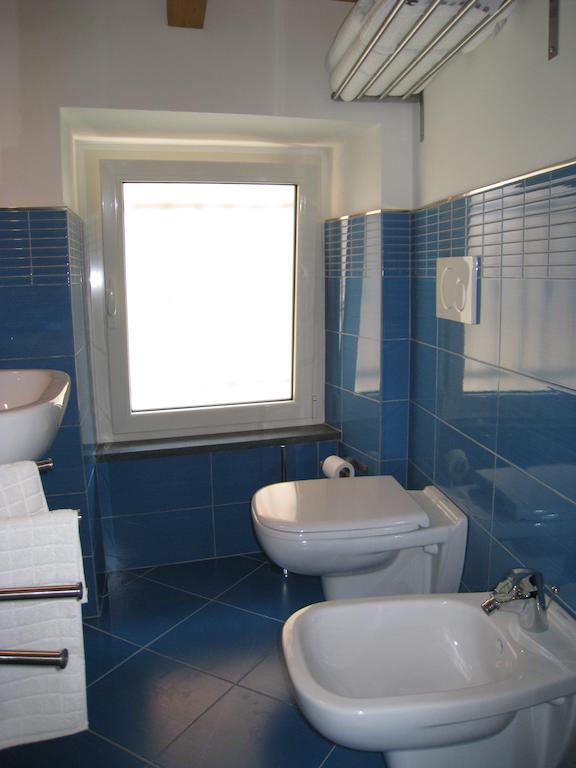 Casa Vacanze Albachiara Massa  Bilik gambar